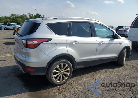 2017 Ford Escape Titanium z USA, uszkodzony, nr VIN 1FMCU9J98HUA58277